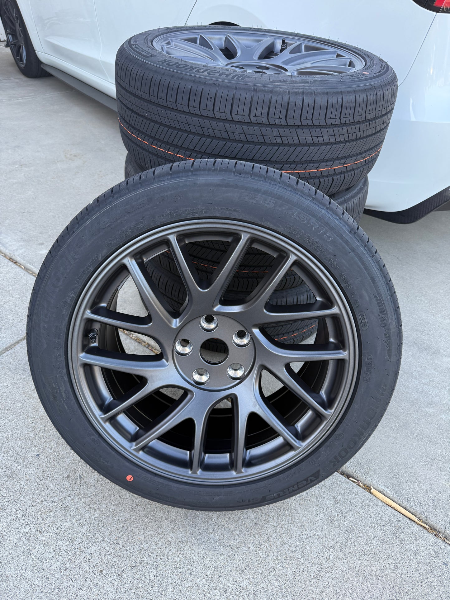Tesla Model 3 Highland Photon Wheel & Tire Package – 18″ (Brand New OEM)